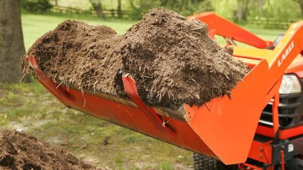 Madison Wi commercial mulching services, with our tractors and more we have the right tools for the job.